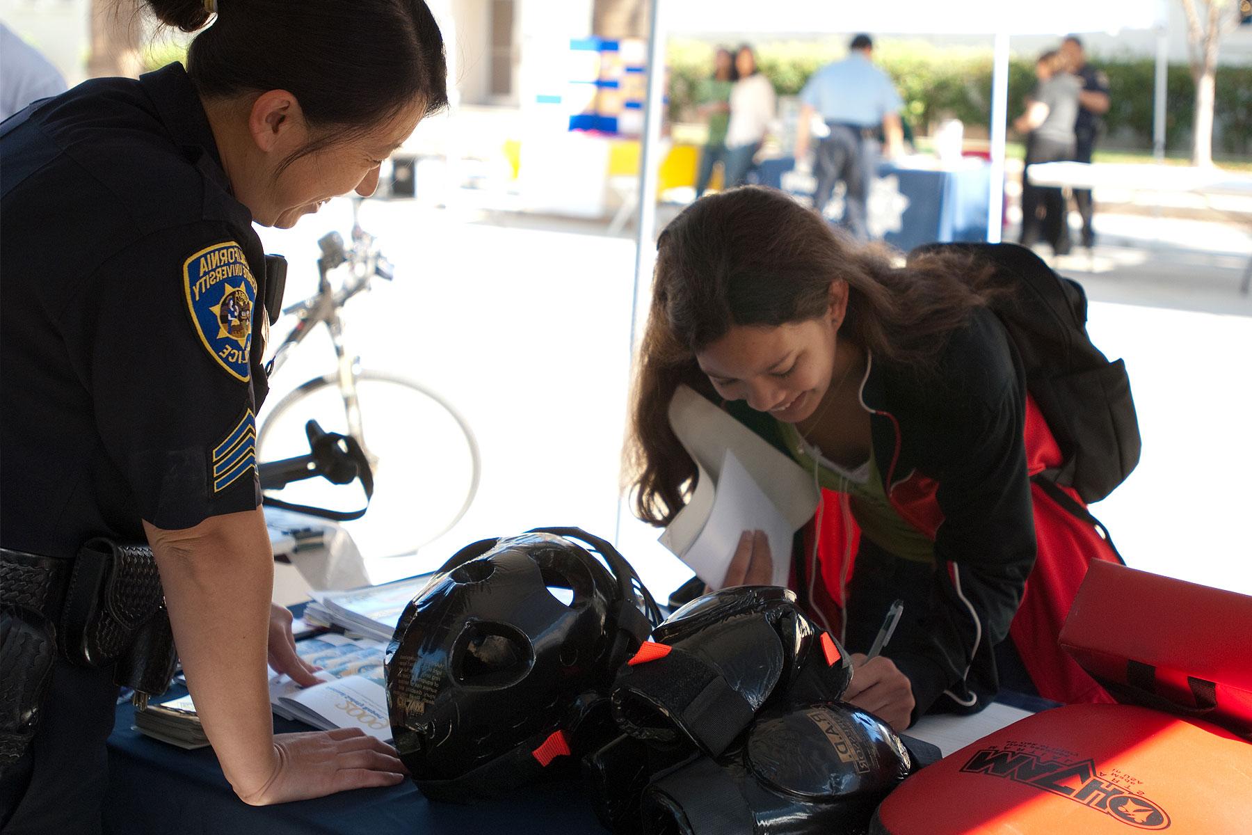 Annual UPD 安全 Fair took place at the Paseo de Cesar Chavez pathway. 